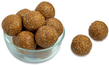 https://cdn.shopify.com/s/files/1/1857/6931/products/NuvvulaLaddu.jpg?v=1621427736